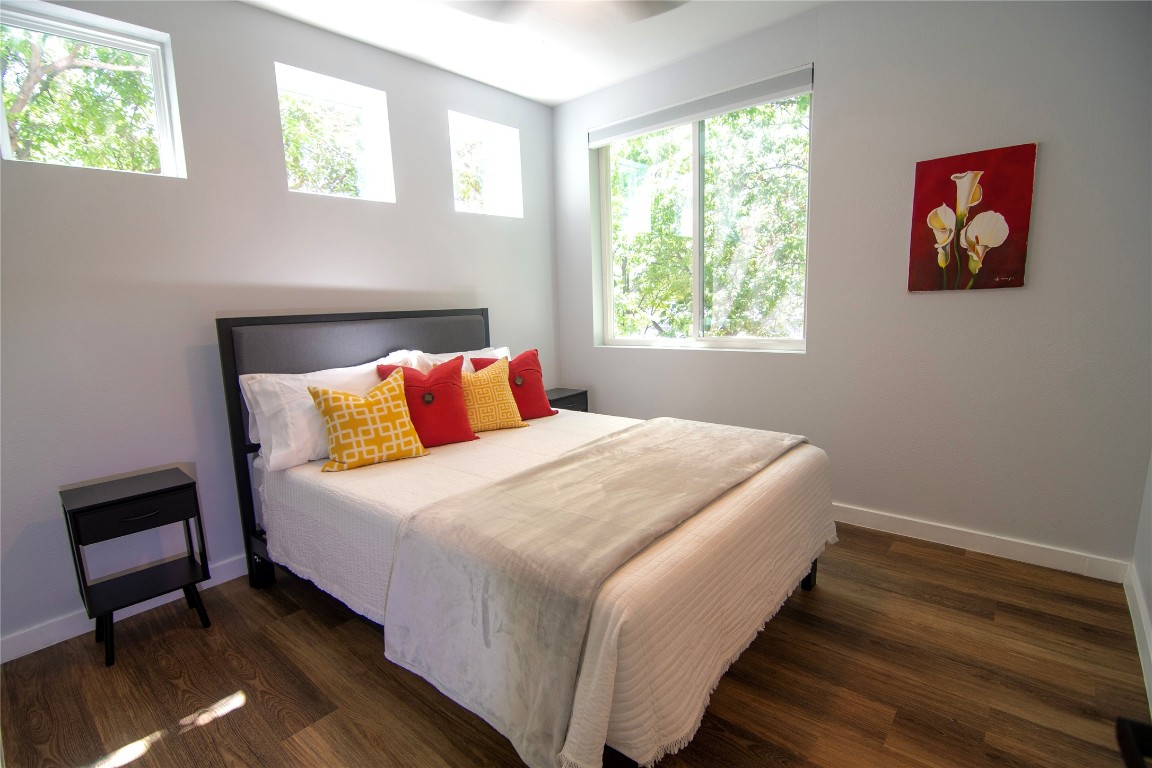 3508 Robinson Avenue, Unit B Austin, TX 78722 - Photo 12 of 17 a bedroom with bed and window