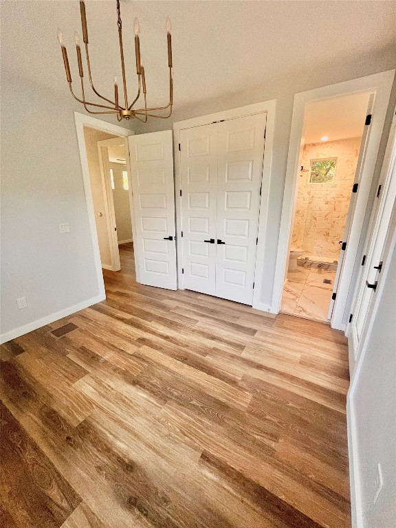 3508 Robinson Avenue, Unit B Austin, TX 78722 - Photo 5 of 17 a view of a room with wooden floor