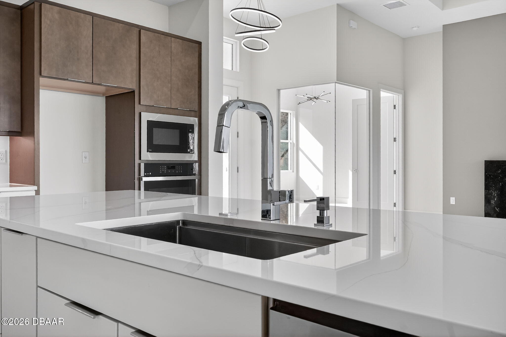 2 Huntsman Look Ormond Beach, FL 32174 - Photo 15 of 57 a kitchen with stainless steel appliances a sink and a refrigerator