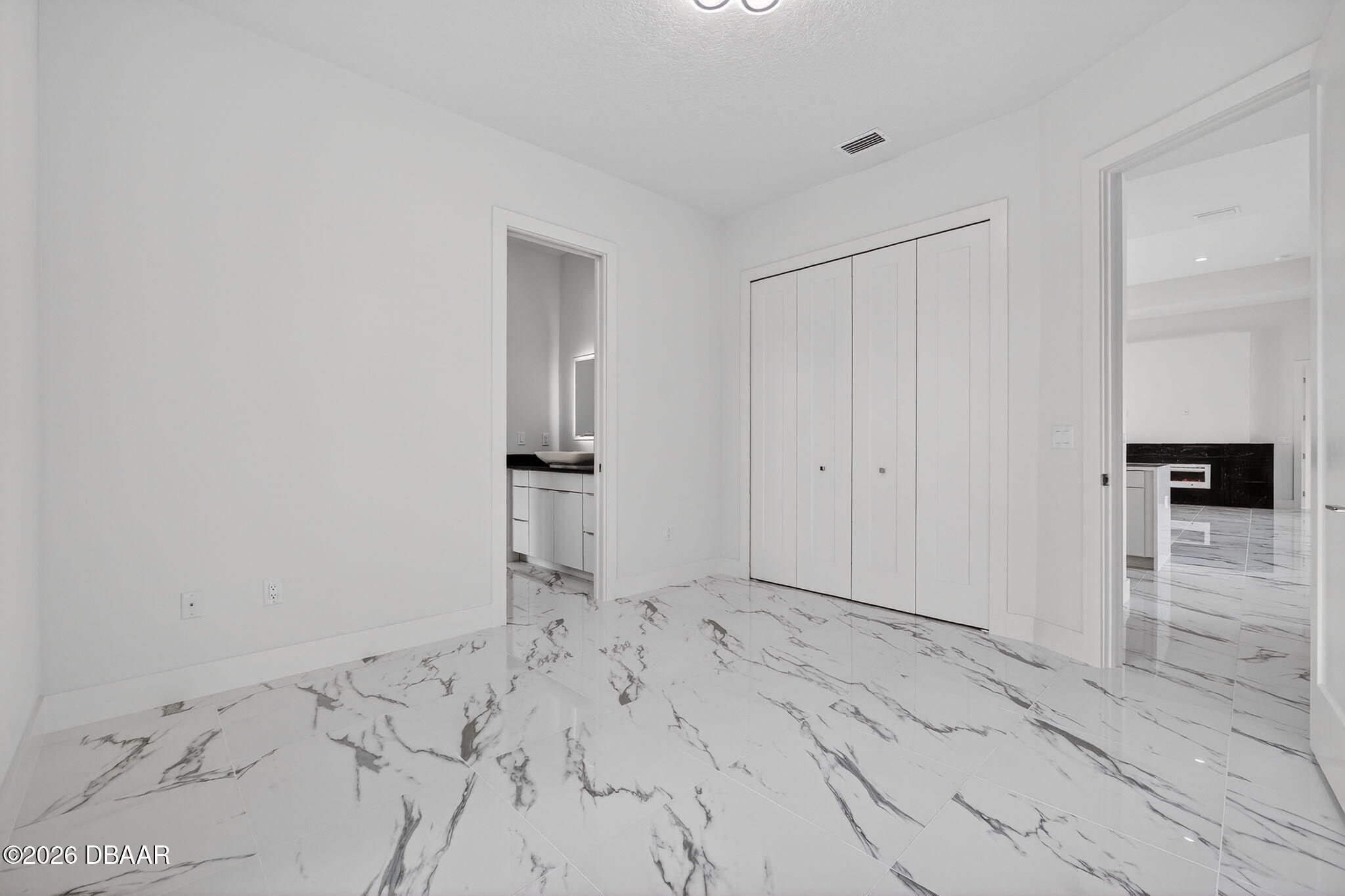 2 Huntsman Look Ormond Beach, FL 32174 - Photo 23 of 57 a view of a closet area with wooden floor