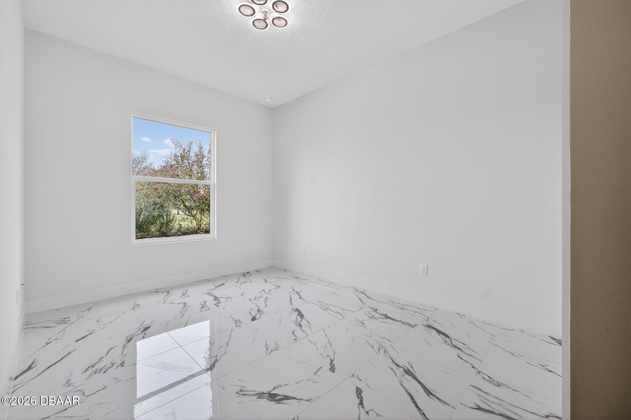 2 Huntsman Look Ormond Beach, FL 32174 - Photo 24 of 57 an empty room with windows