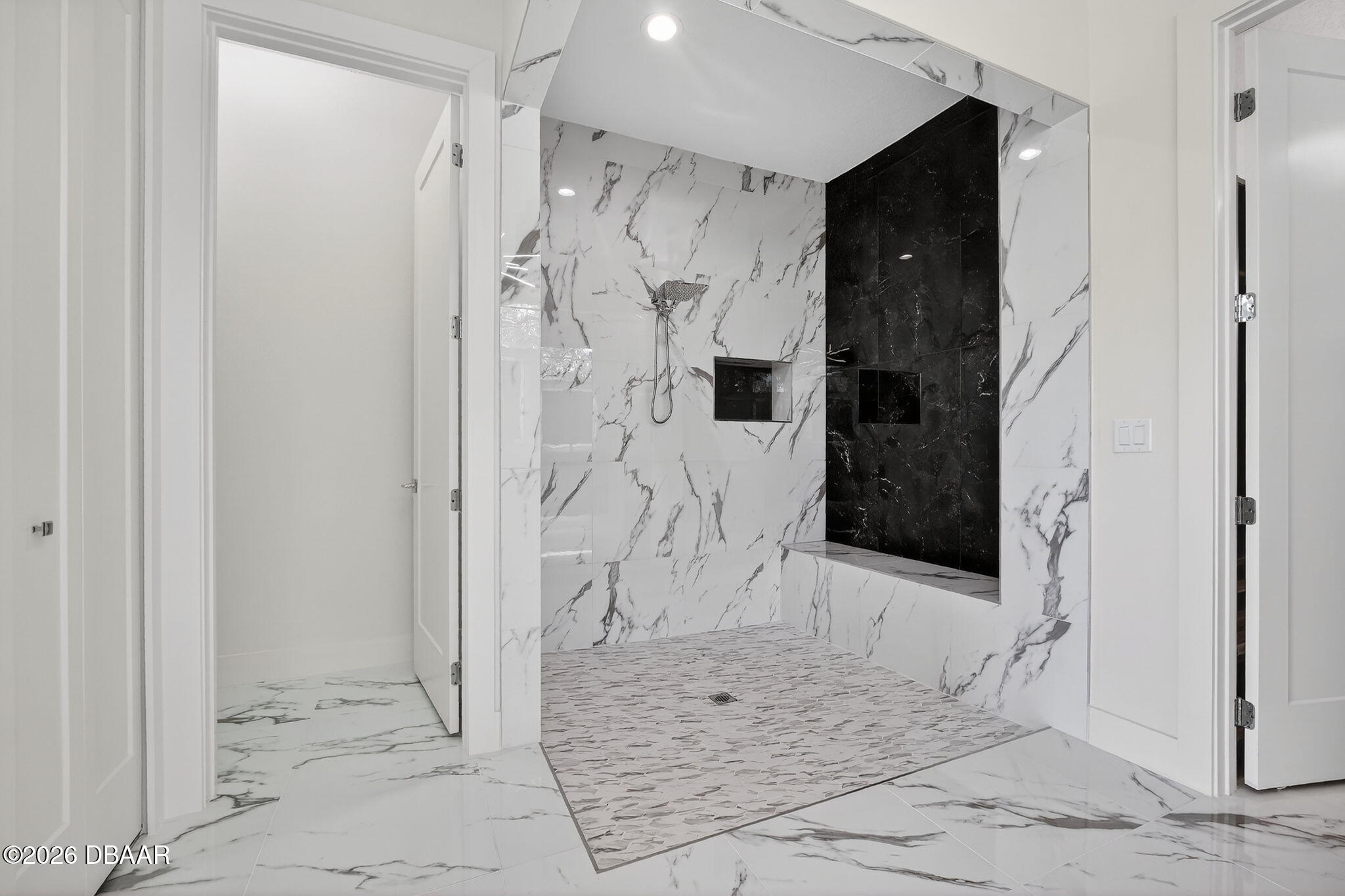 2 Huntsman Look Ormond Beach, FL 32174 - Photo 36 of 57 a view of a bathroom with a shower and a sink