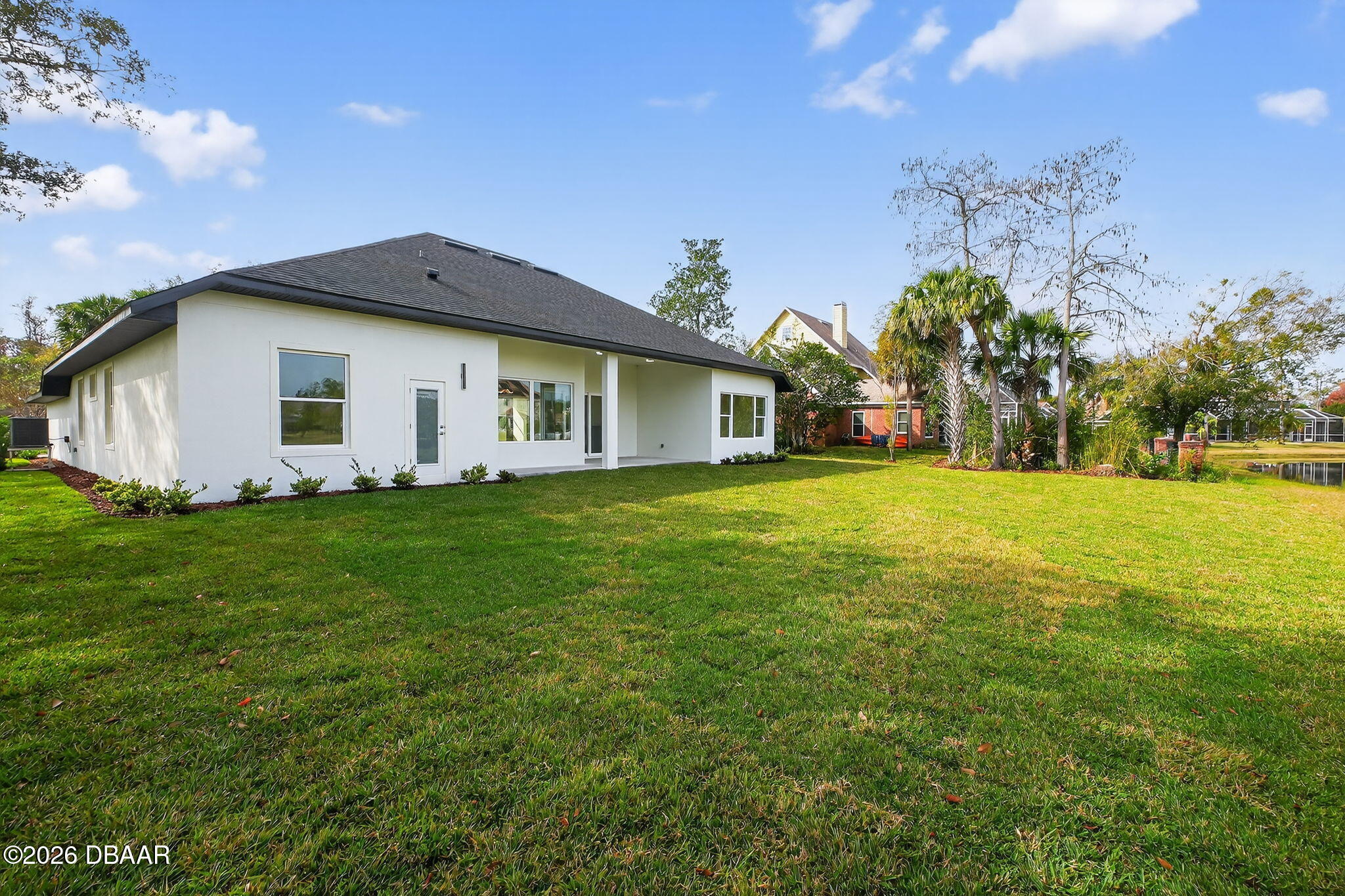 2 Huntsman Look Ormond Beach, FL 32174 - Photo 50 of 57 a view of a house with a yard