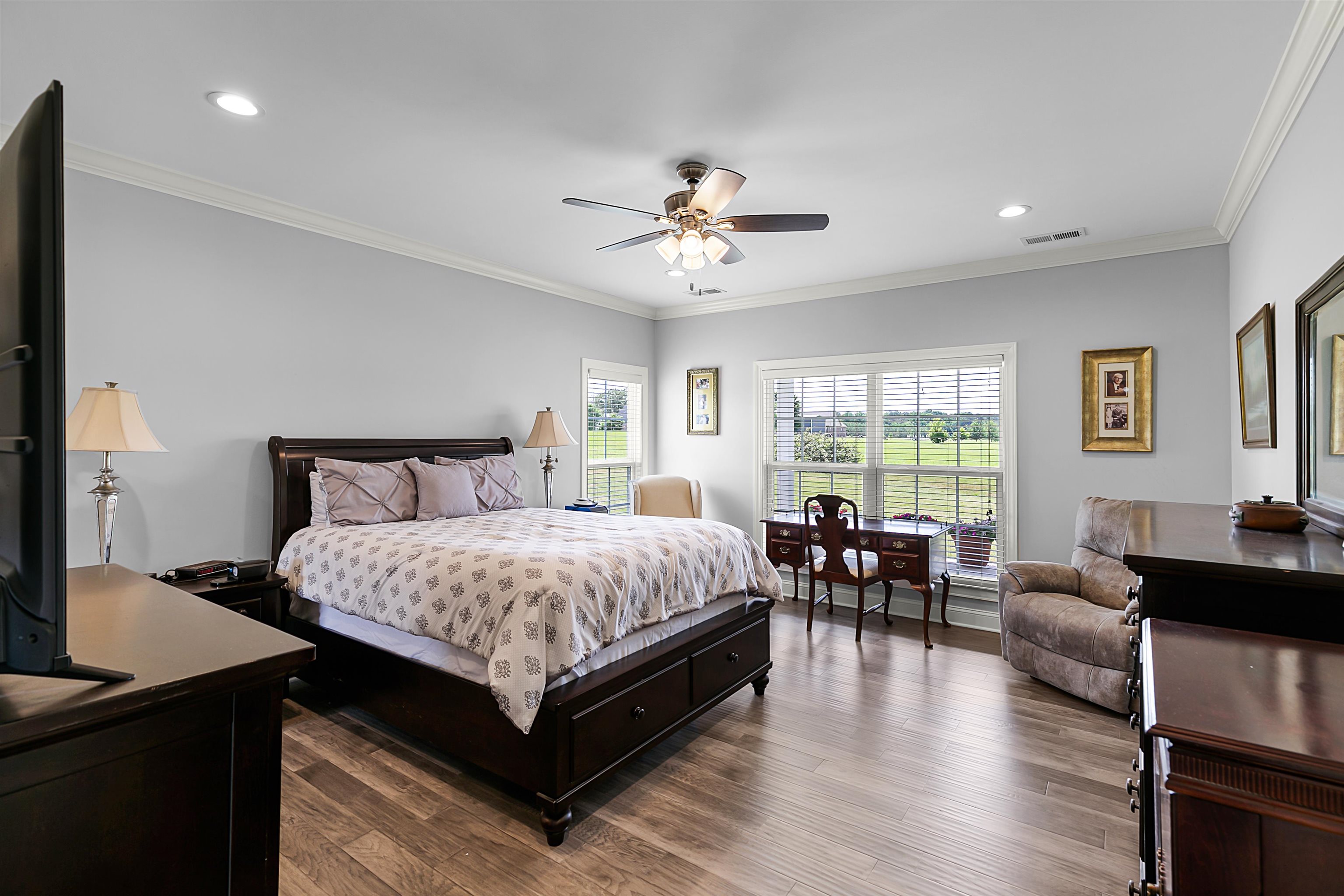3250 Carroll Road Michie, TN 38357 - Photo 16 of 25 a bedroom with a bed and wooden floor