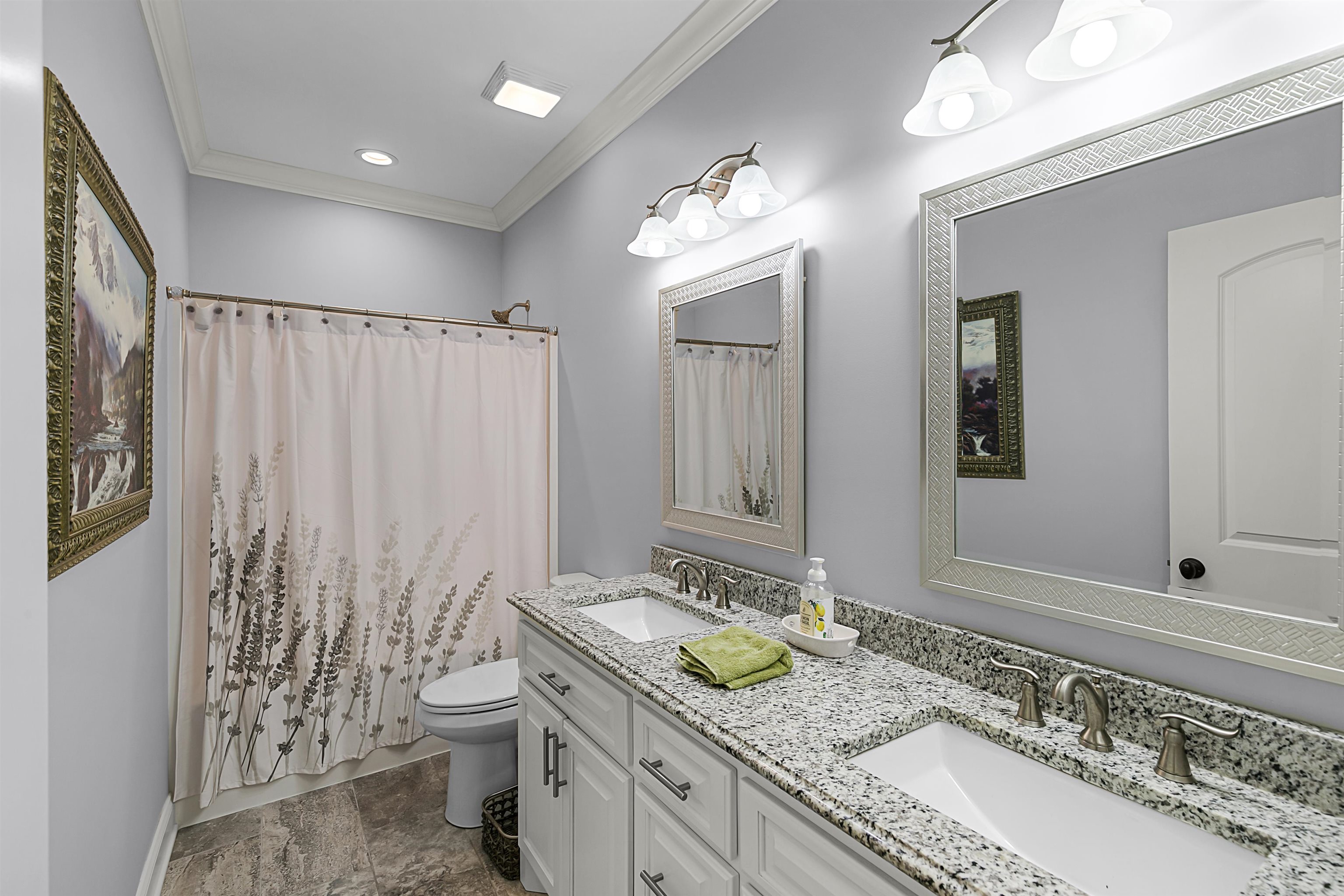 3250 Carroll Road Michie, TN 38357 - Photo 21 of 25 a bathroom with double vanity and a mirror