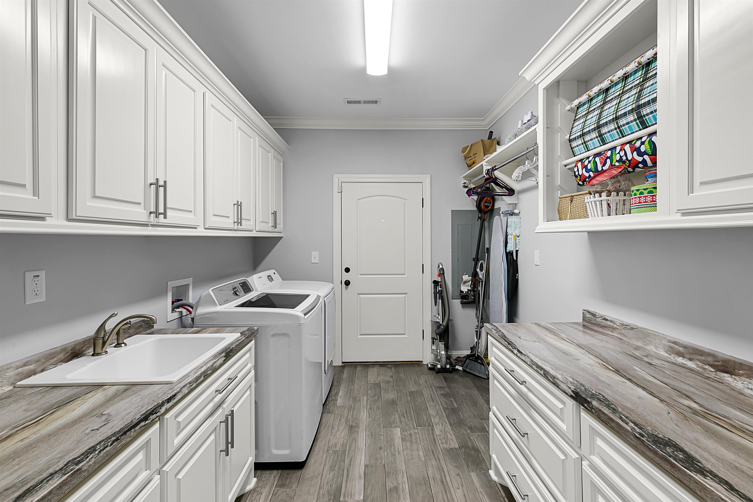 3250 Carroll Road Michie, TN 38357 - Photo 23 of 25 a kitchen with a sink a stove and cabinets