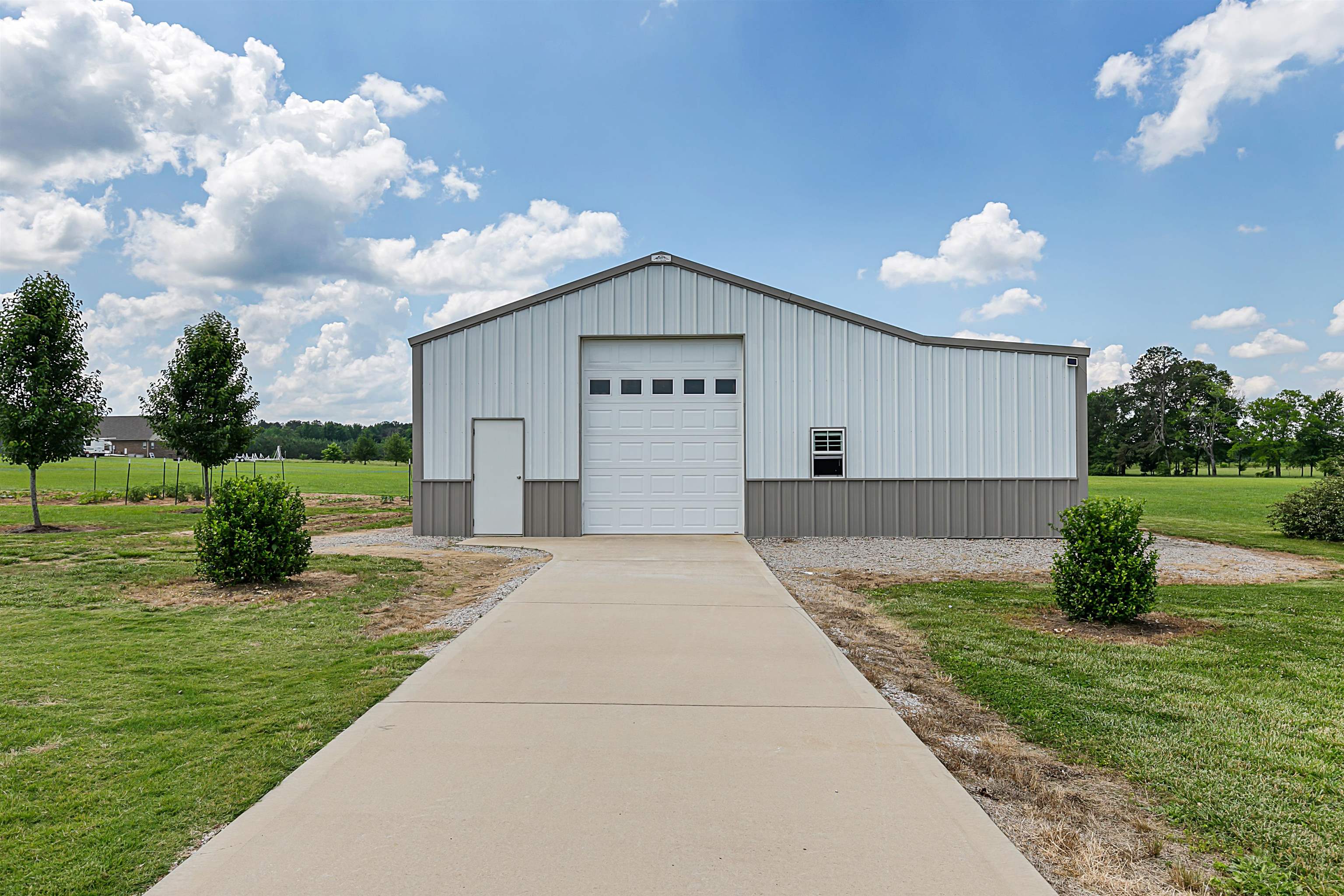 3250 Carroll Road Michie, TN 38357 - Photo 6 of 25 a view of a house with backyard and garden