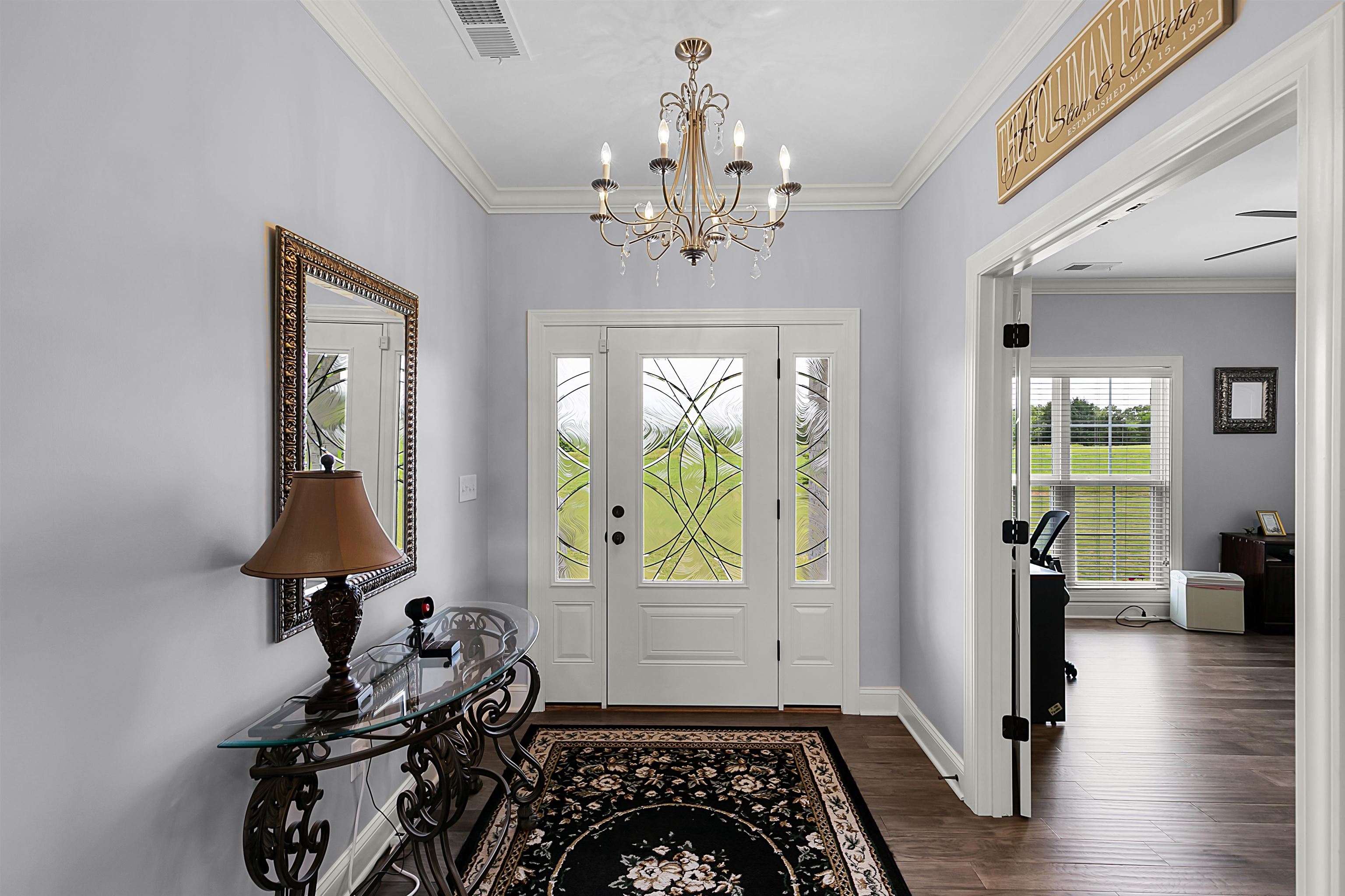 3250 Carroll Road Michie, TN 38357 - Photo 8 of 25 a very nice looking room with furniture window and wooden floor