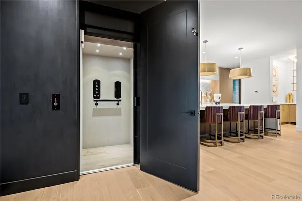 a bathroom with a mirror and a sink