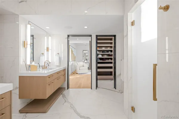 a view of walk in closet and window