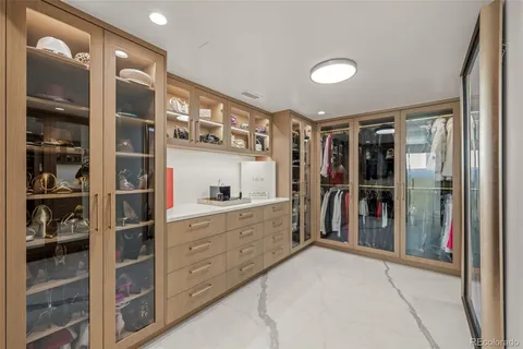 a view of a hallway and a washer and dryer
