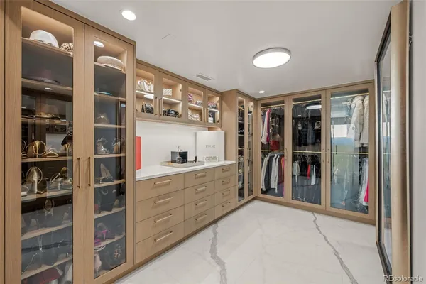 a view of a hallway and a washer and dryer