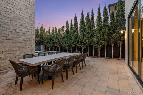 a building exterior with furniture