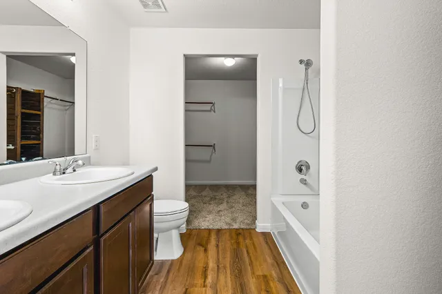 a bathroom with a sink and mirror