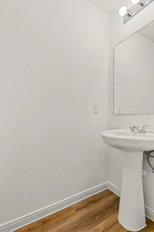 a bathroom with a sink and a toilet