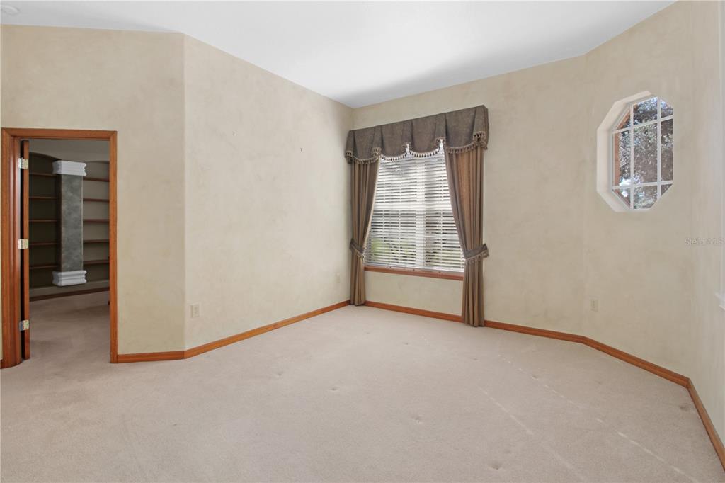 400 Interlachen Court DeBary, FL 32713 - Photo 31 of 42 an empty room with windows