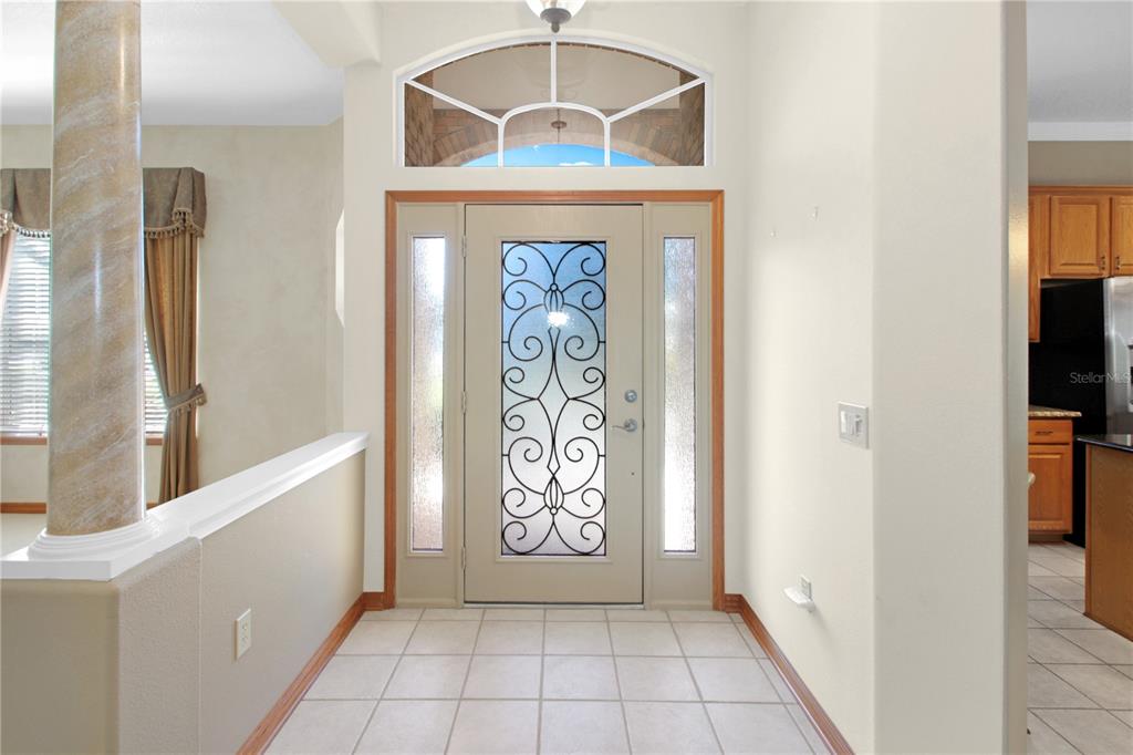400 Interlachen Court DeBary, FL 32713 - Photo 5 of 42 a view of an entryway with a window