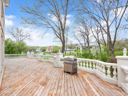a view of roof deck with patio