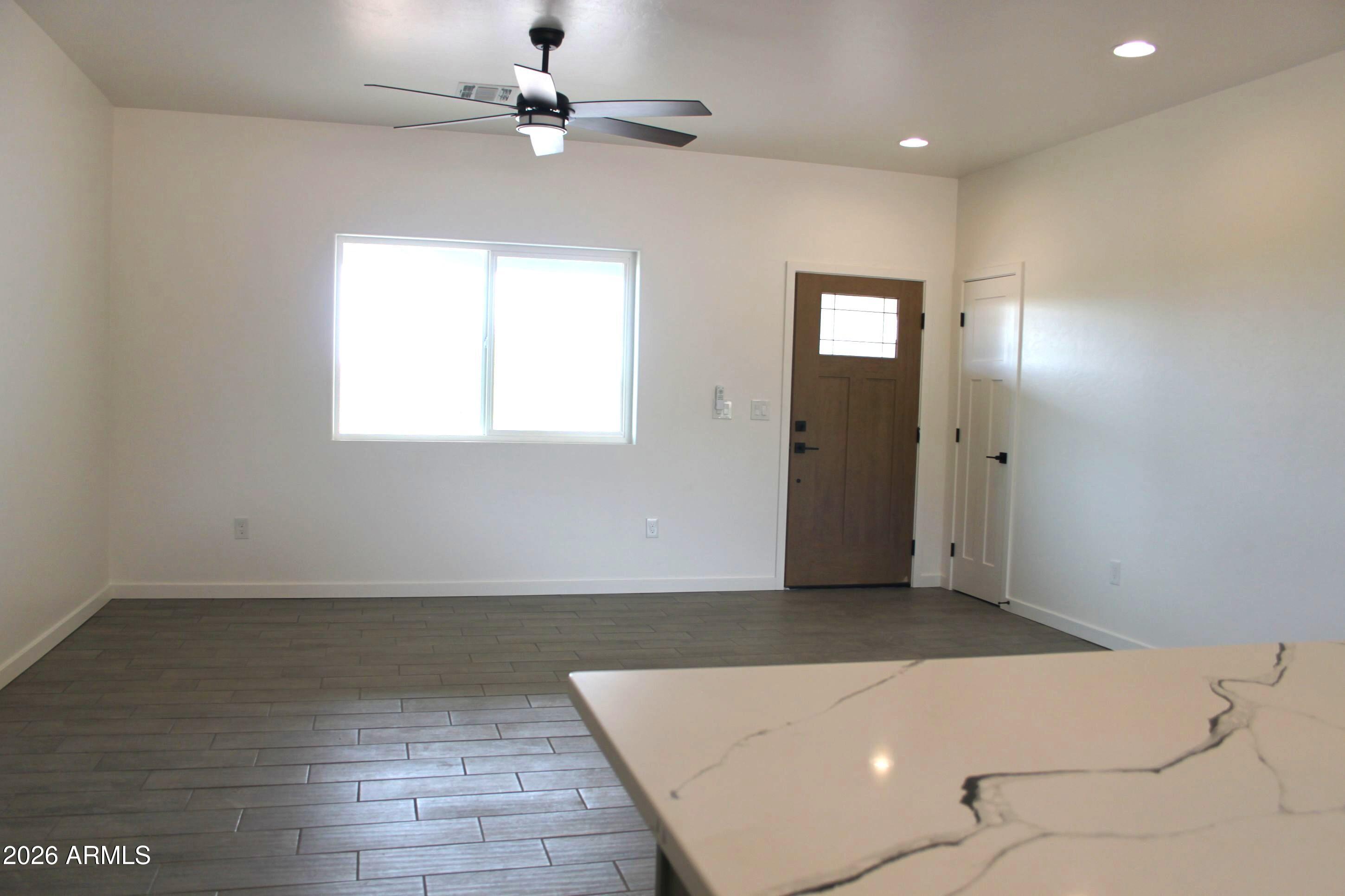 6370 South Jaxel Road Hereford, AZ 85615 - Photo 11 of 58 an entryway in a hall with a window