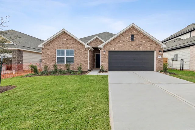 $344,990 | 982 Garden Path Drive, Willis, TX 77378