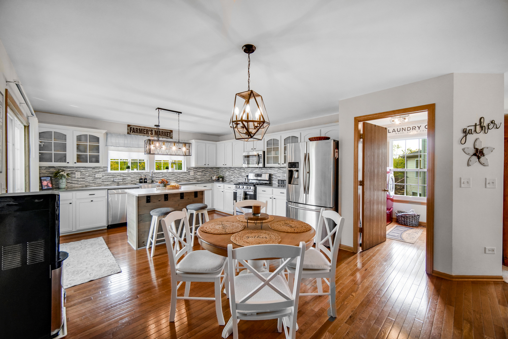 25421 Faraday Road Manhattan, IL 60442 - Photo 11 of 36 a view of a dining room with furniture window and wooden floor