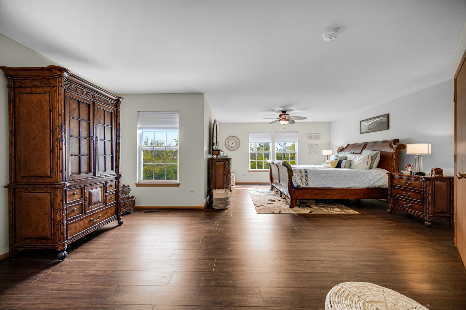 25421 Faraday Road Manhattan, IL 60442 - Photo 16 of 36 a bedroom with furniture window and wooden floor