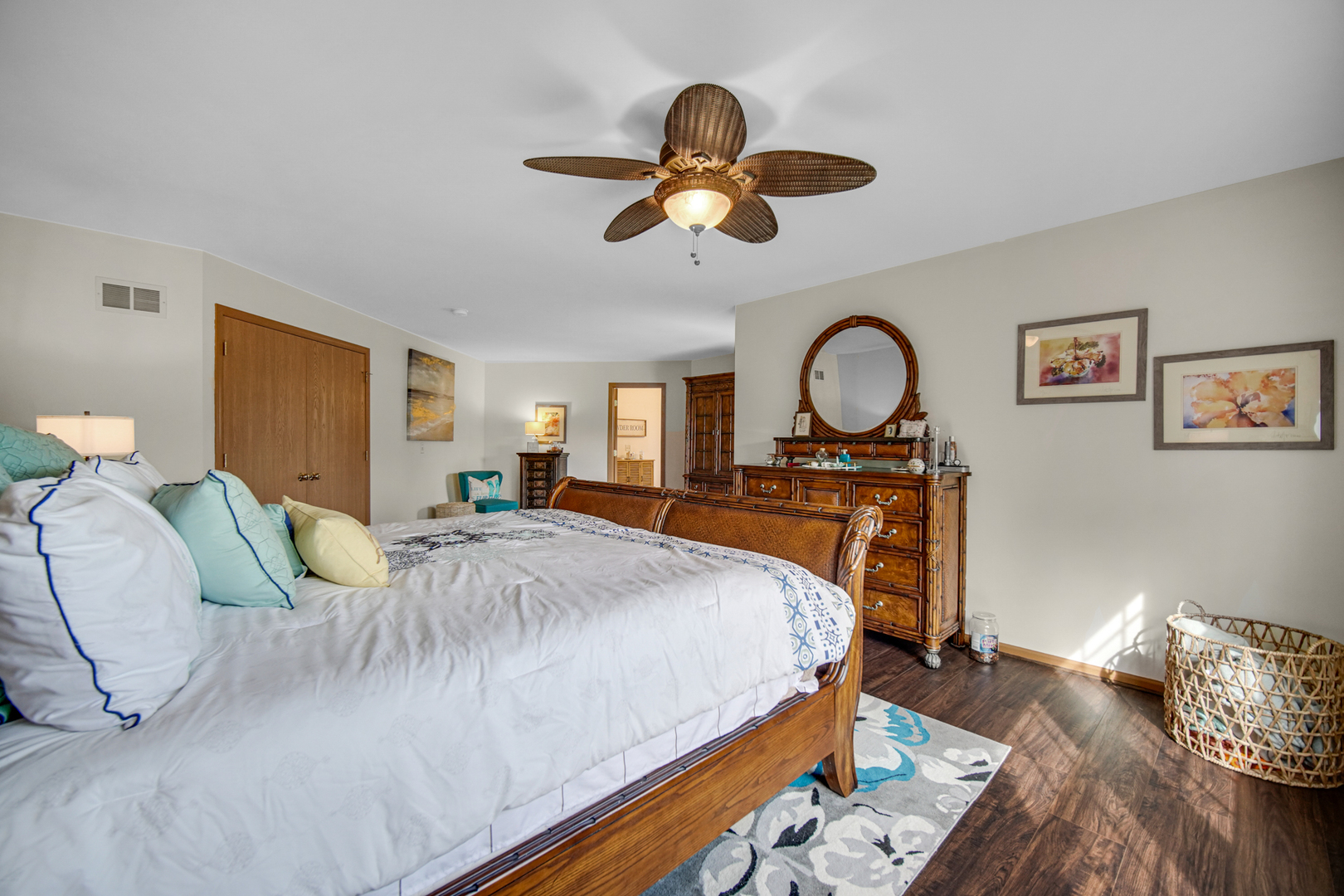 25421 Faraday Road Manhattan, IL 60442 - Photo 17 of 36 a bedroom with a bed and a chandelier