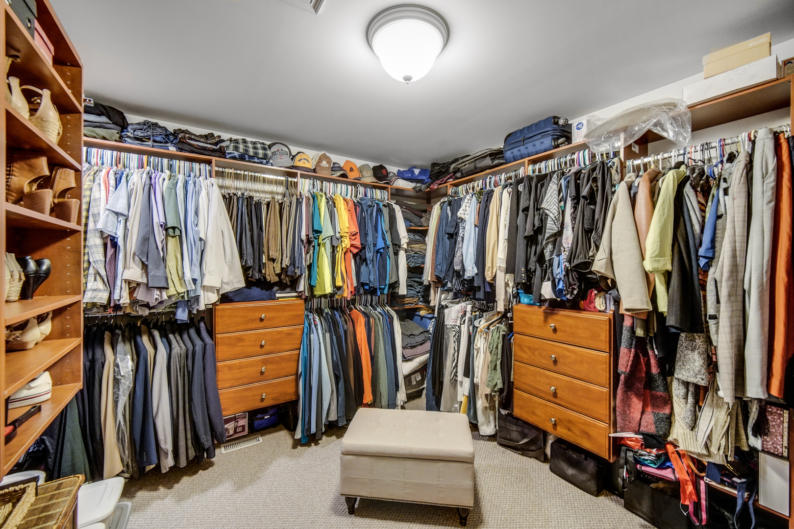 25421 Faraday Road Manhattan, IL 60442 - Photo 18 of 36 a view of walk in closet with clothes and shoes