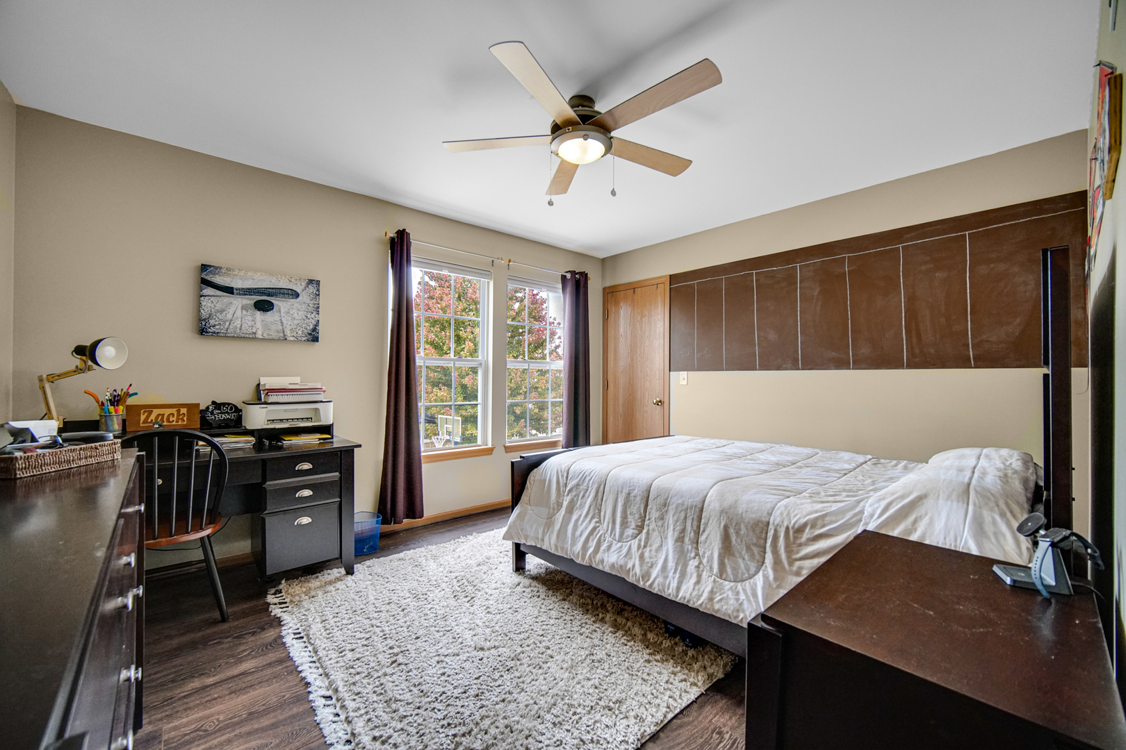 25421 Faraday Road Manhattan, IL 60442 - Photo 19 of 36 a bedroom with a bed and wooden floor