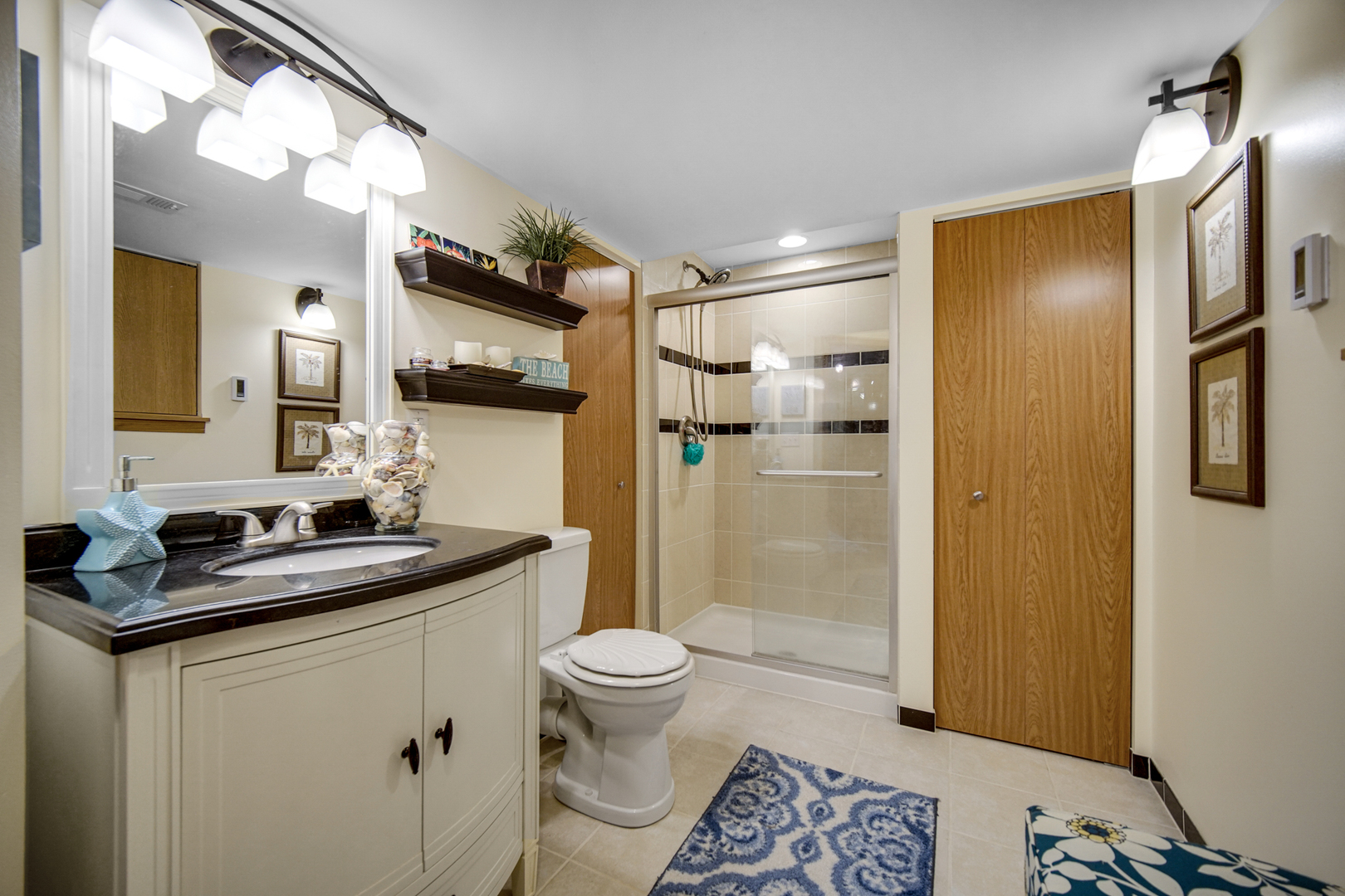 25421 Faraday Road Manhattan, IL 60442 - Photo 23 of 36 a bathroom with a sink a toilet and shower