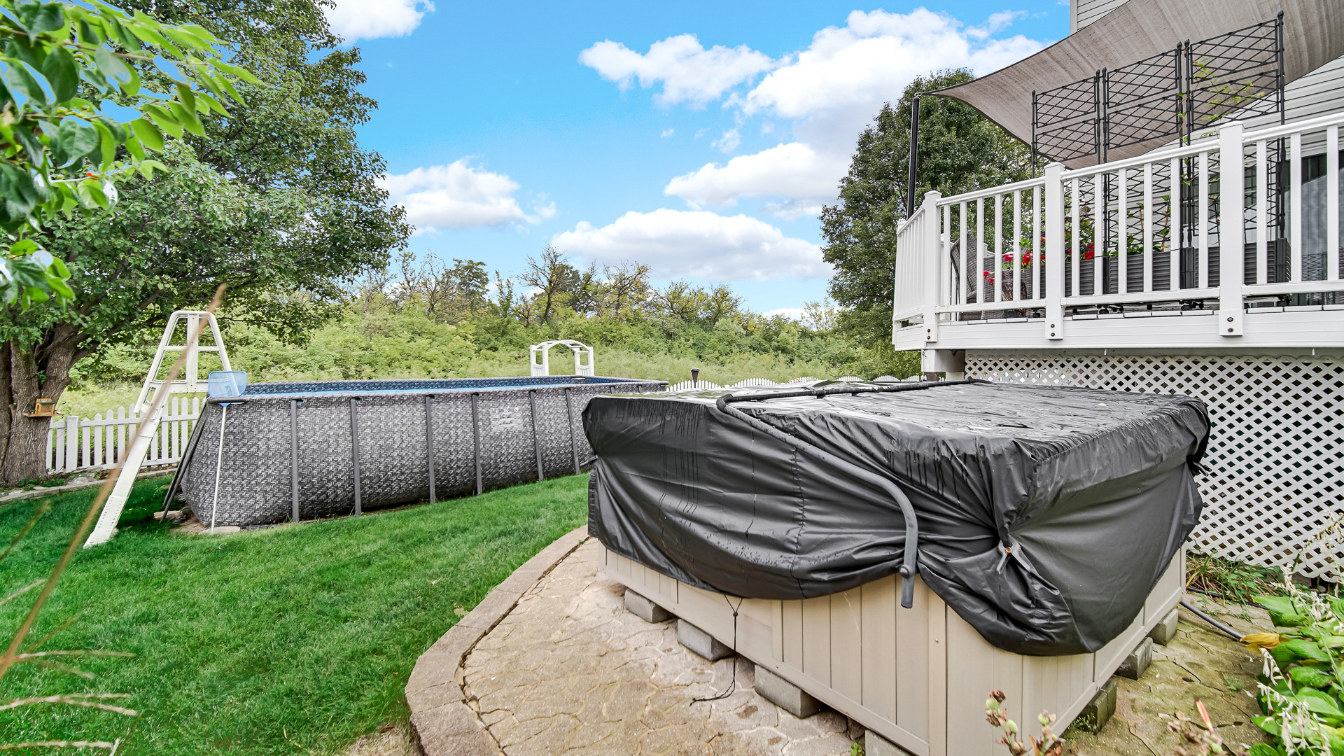 25421 Faraday Road Manhattan, IL 60442 - Photo 30 of 36 a view of a backyard with a swing