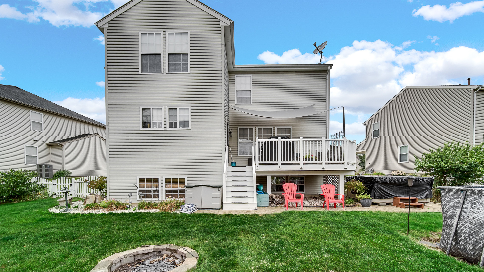 25421 Faraday Road Manhattan, IL 60442 - Photo 31 of 36 a view of a house with a yard and a deck