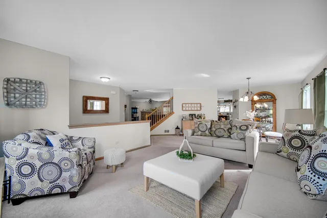 a living room with furniture and a couch