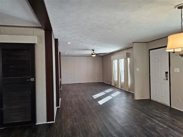 a view of entryway with wooden floor
