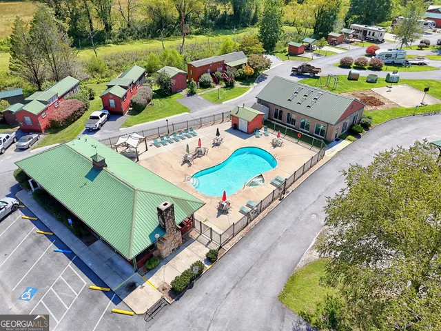 a view of a swimming pool with a patio
