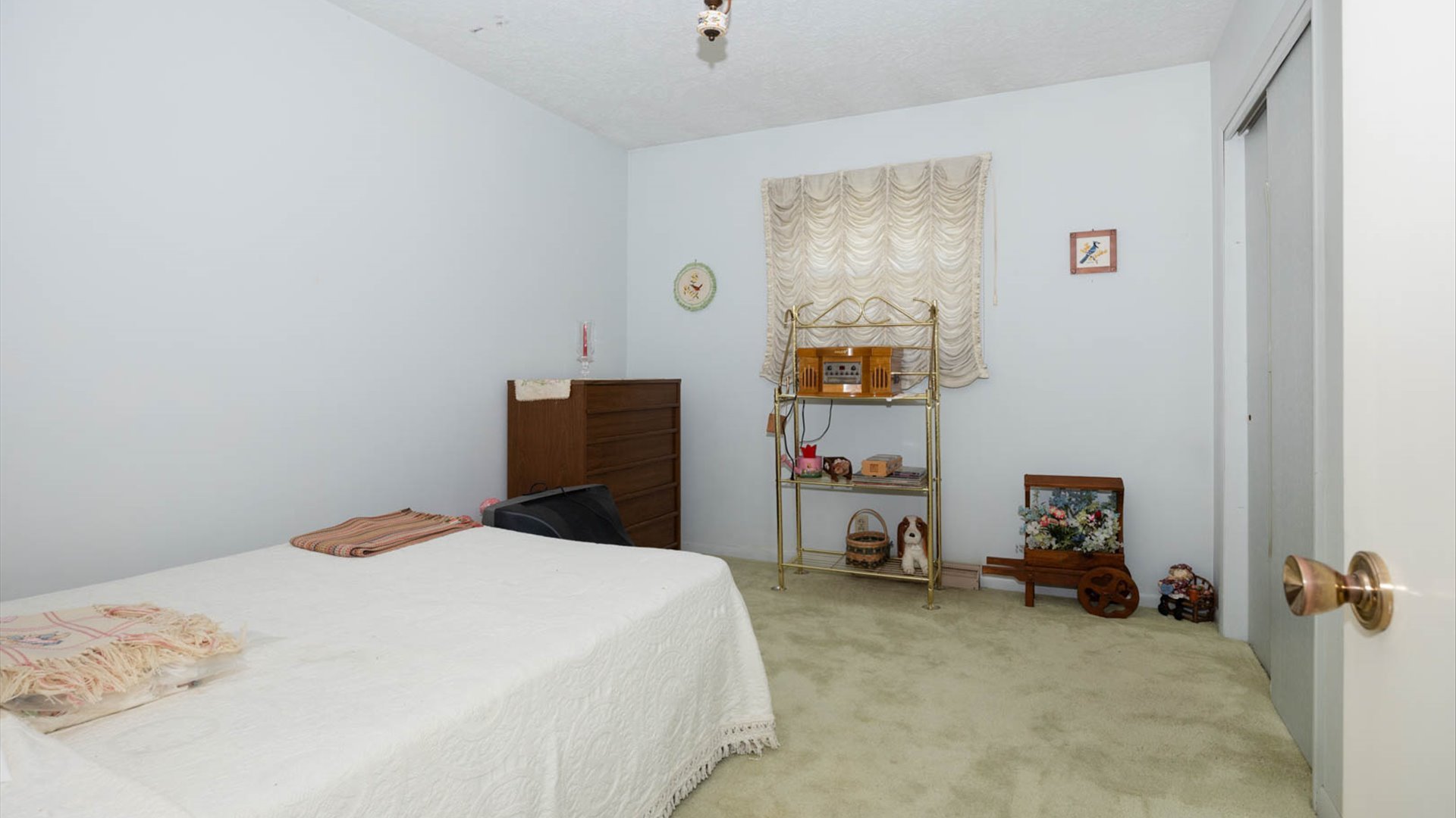 1209 Spear Drive Normal, IL 61761 - Photo 13 of 31 a bedroom with a bed and a table