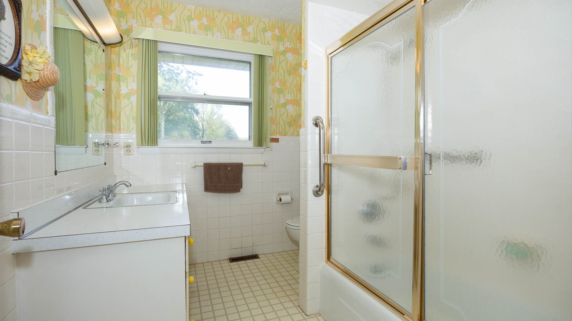 1209 Spear Drive Normal, IL 61761 - Photo 14 of 31 a bathroom with a sink toilet and shower