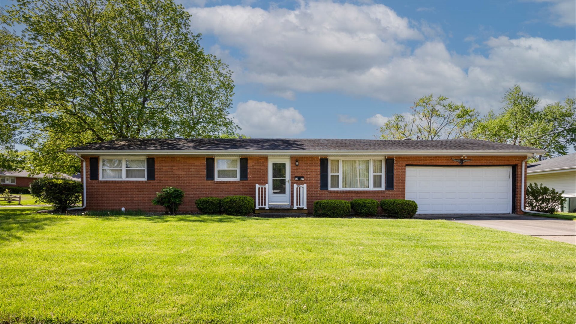 1209 Spear Drive Normal, IL 61761 - Photo 31 of 31 a front view of a house with yard and green space