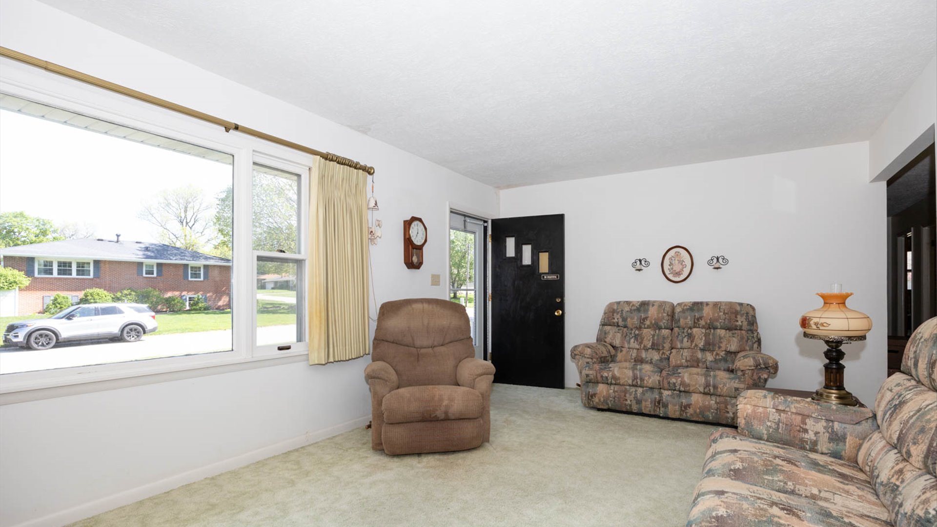 1209 Spear Drive Normal, IL 61761 - Photo 4 of 31 a living room with furniture and a large window