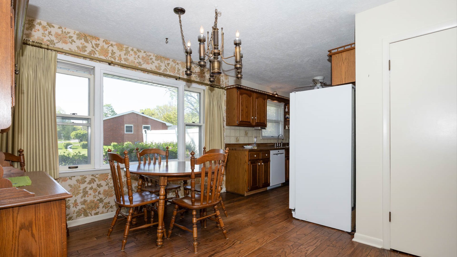 1209 Spear Drive Normal, IL 61761 - Photo 7 of 31 a view of a dining room with furniture window and outside view