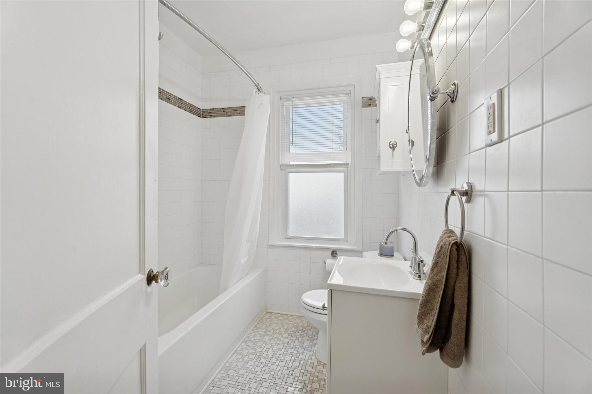 320 East Phil Ellena Street Philadelphia, PA 19119 - Photo 17 of 21 a bathroom with a sink a toilet and shower