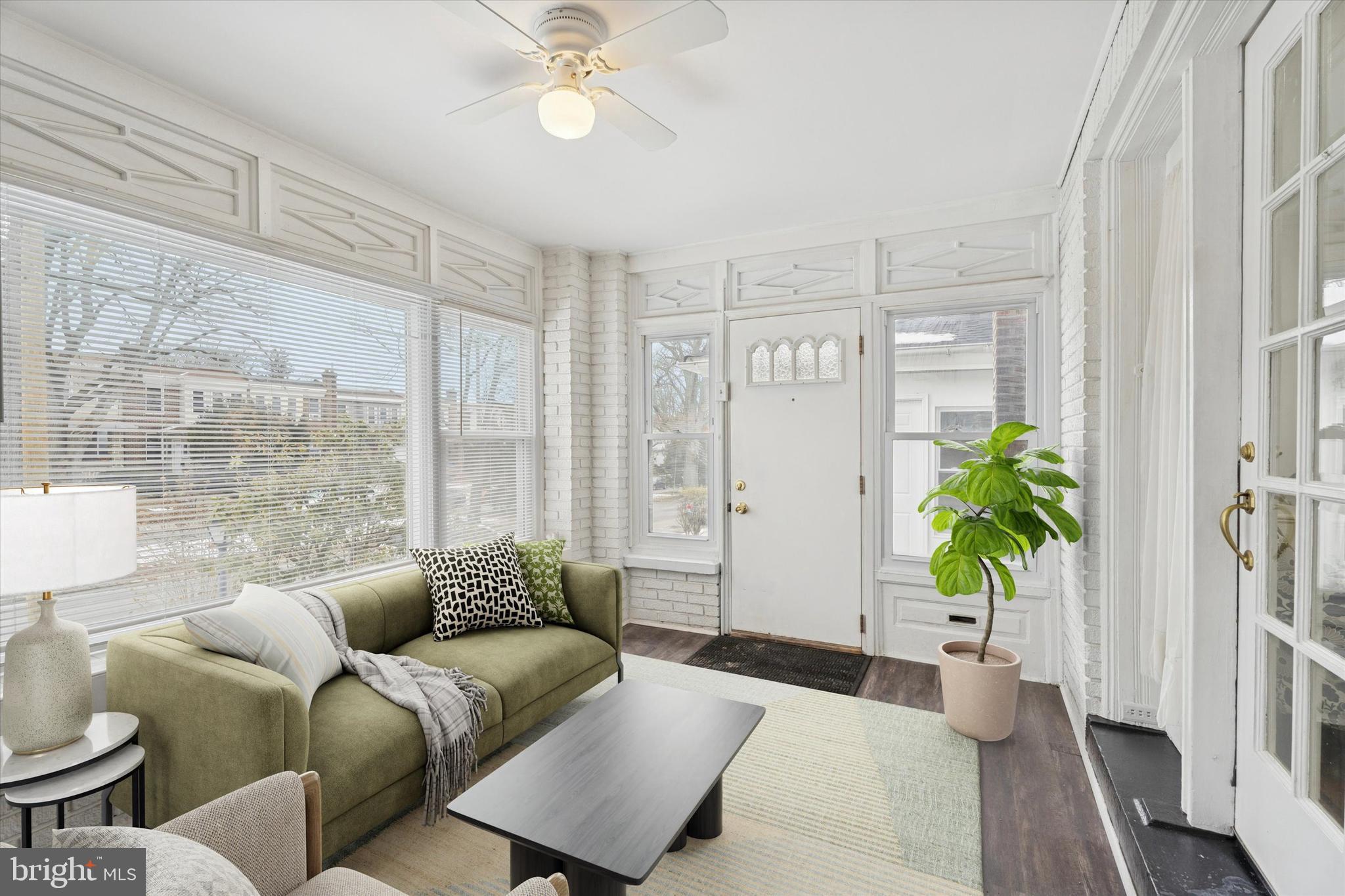 320 East Phil Ellena Street Philadelphia, PA 19119 - Photo 2 of 21 a living room with furniture and a potted plant