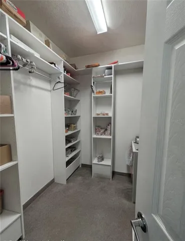 a bathroom with a sink vanity and a mirror