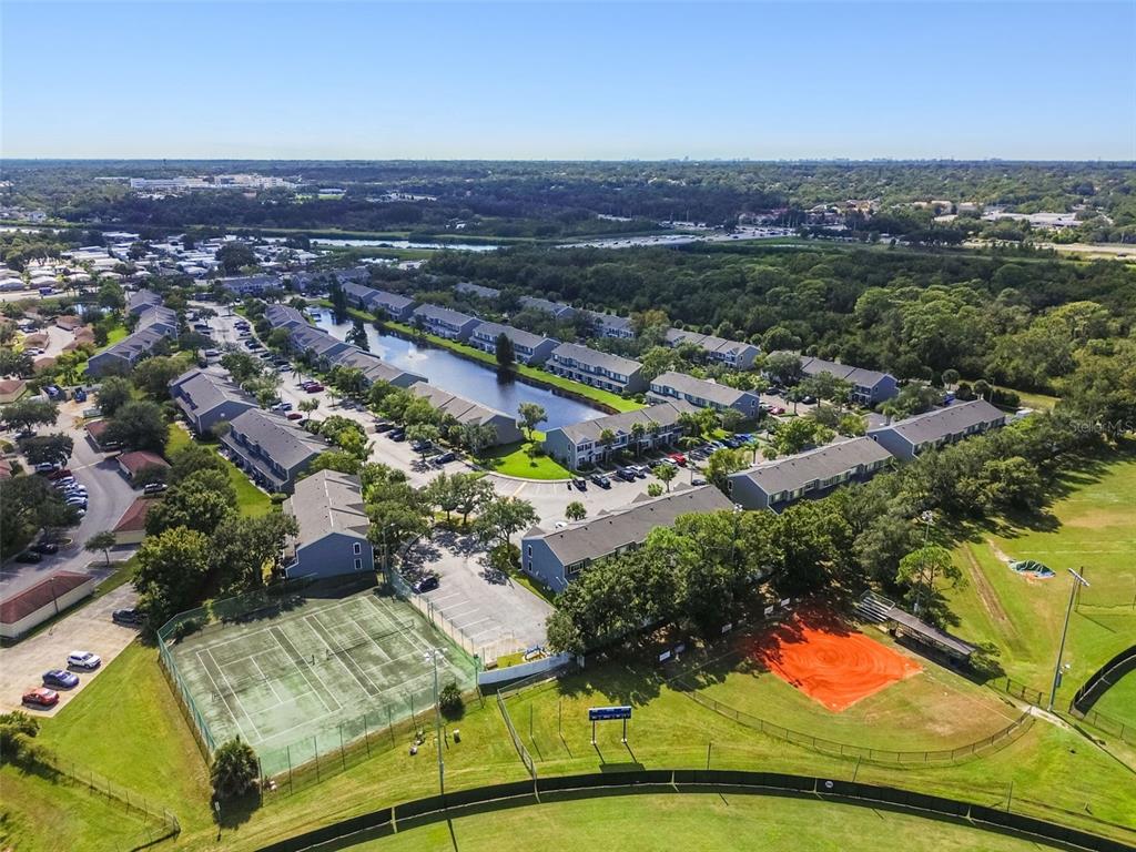 382 Countryside Key Boulevard Oldsmar, FL 34677 - Photo 53 of 58 an aerial view of residential houses with outdoor space