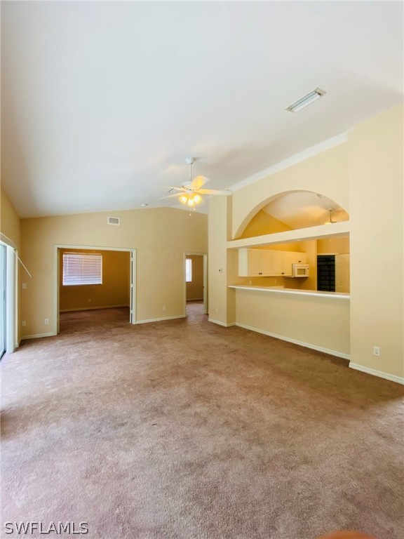 9060 Pineapple Road Fort Myers, FL 33967 - Photo 17 of 33 a view of an empty room with a fireplace