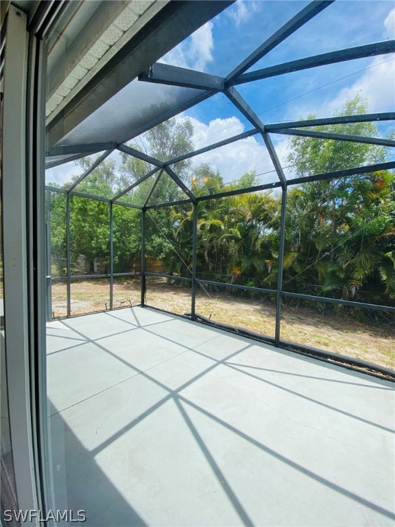 9060 Pineapple Road Fort Myers, FL 33967 - Photo 19 of 33 a view of a room with window and wooden floor