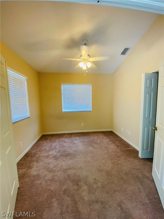 9060 Pineapple Road Fort Myers, FL 33967 - Photo 22 of 33 a view of an empty room with a window