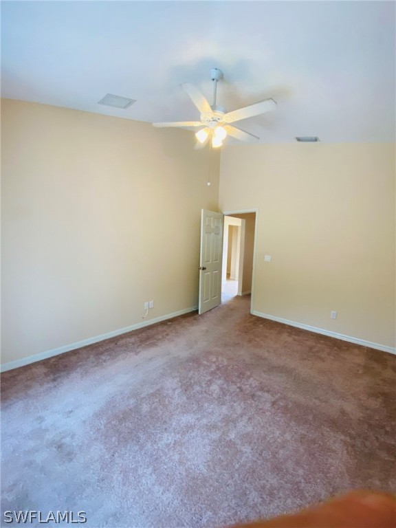 9060 Pineapple Road Fort Myers, FL 33967 - Photo 28 of 33 an empty room with a window and a fan