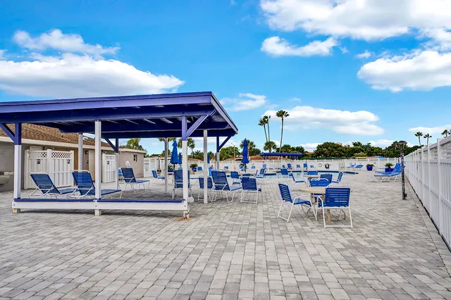 a view of a terrace with chairs