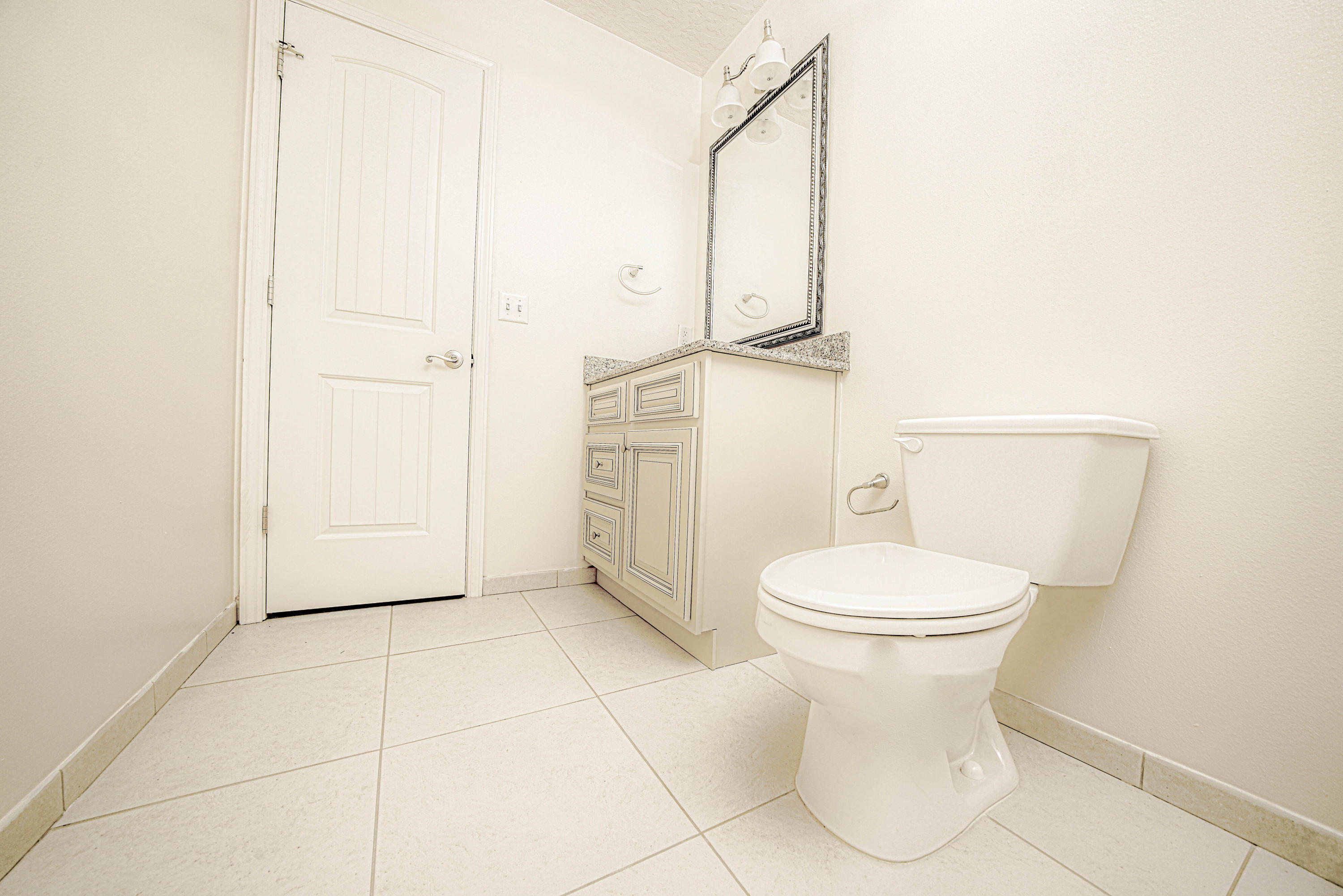 4582 Hermosa Road Crestview, FL 32539 - Photo 21 of 26 a bathroom with a toilet and a shower
